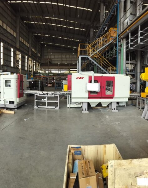 Industrial forging machinery and equipment inside a manufacturing facility